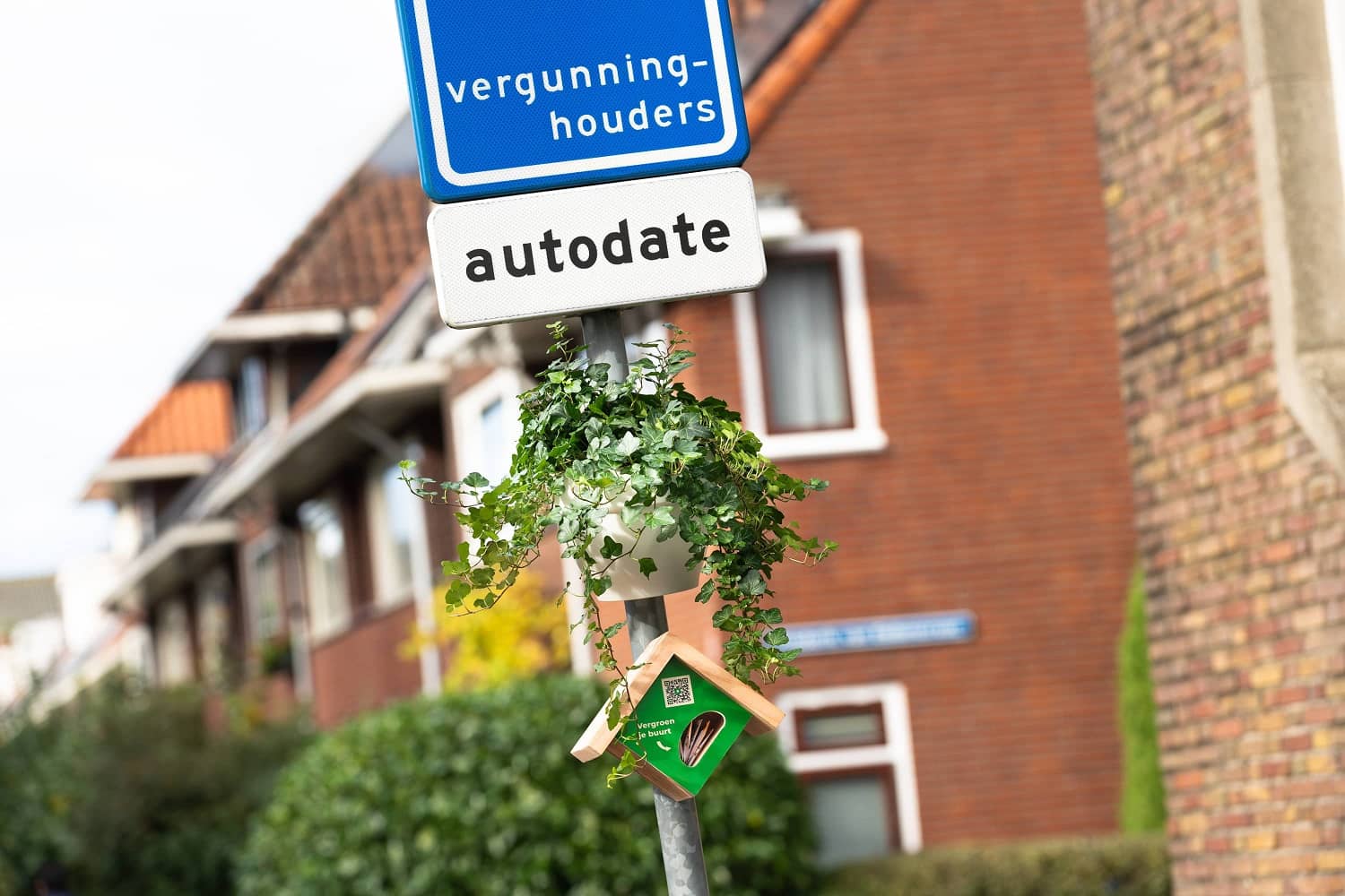 Greenwheels Flower Station bij Autodate Bord Greenwheels deelauto